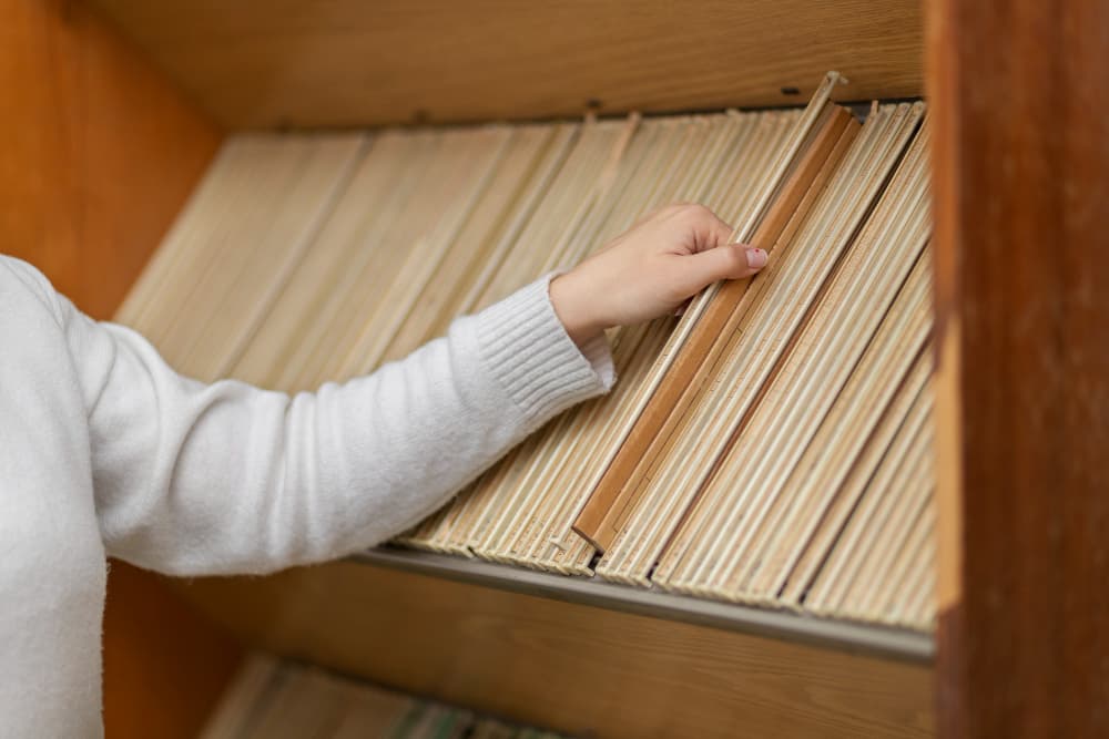 Archive boxes stacked on shelves for long-term document storage